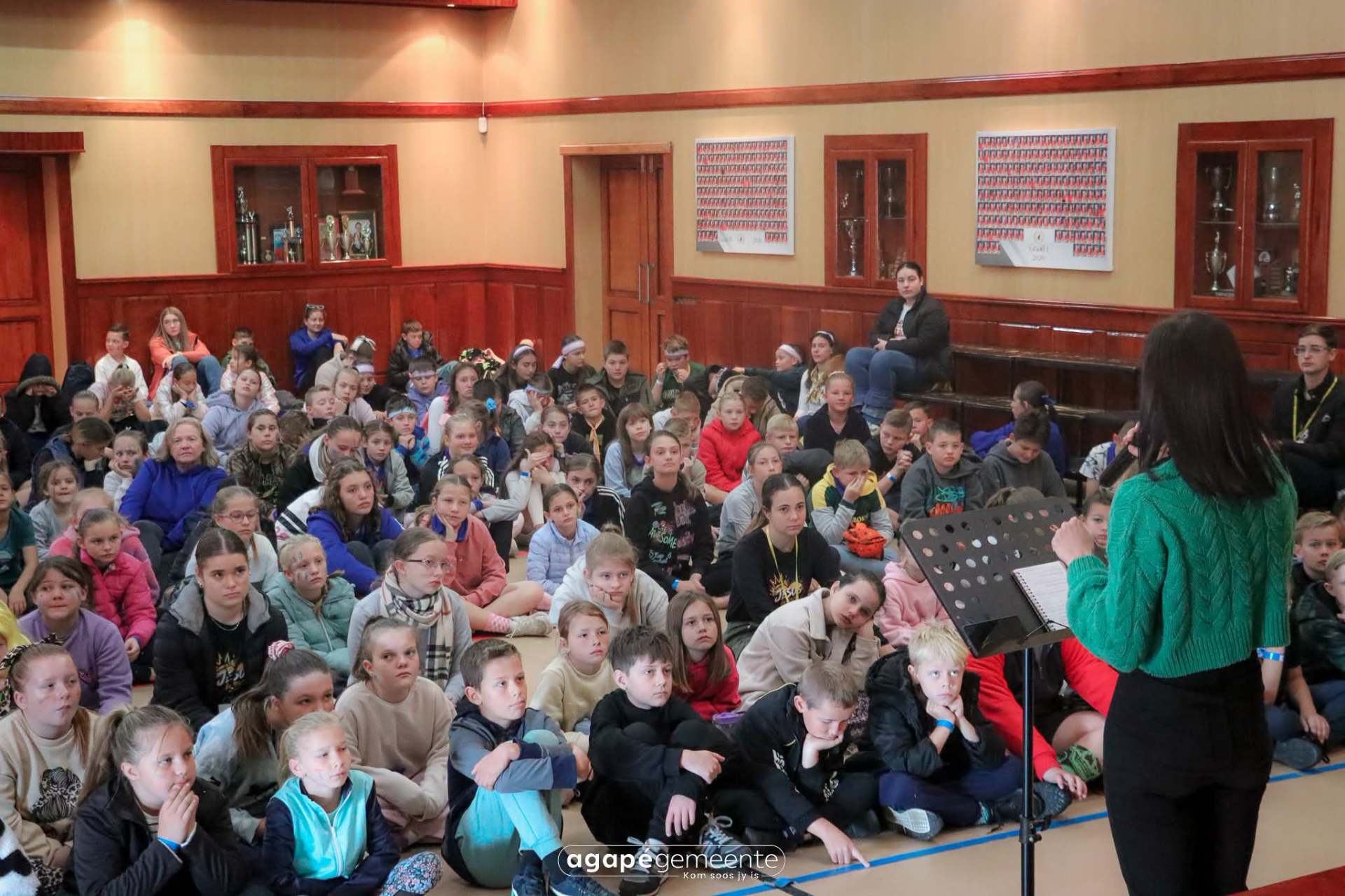 A church youth audience listening